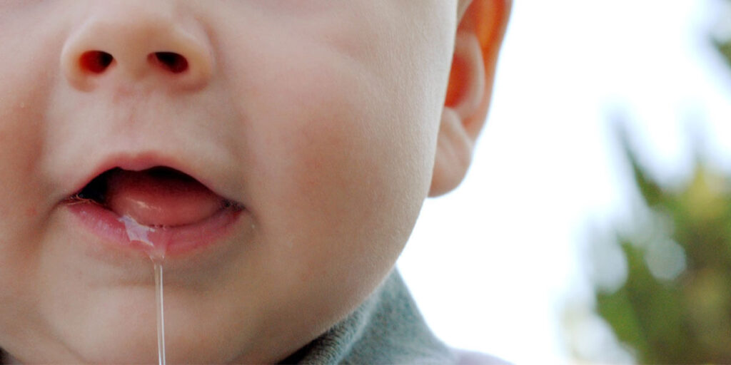 Why Your Baby Spitting Up Clear Liquid